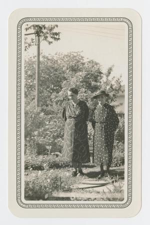Primary view of object titled '[Annie Sharpe and Elizabeth Brown Standing in a Yard]'.