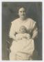 Photograph: [Woman Posing with a Baby]