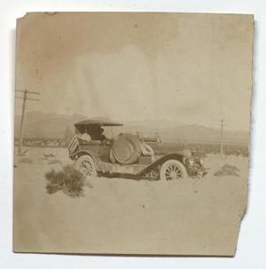 Primary view of object titled '[Pierce-Arrow automobile in sand dunes]'.