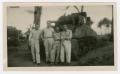 Photograph: [Four Soldiers by a Tank]