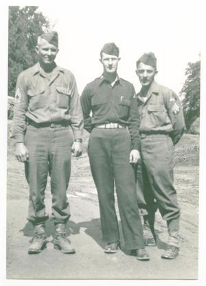 Primary view of object titled '[Three Members of the 12th Armored Division's Combat Command A]'.