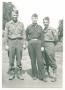 Thumbnail image of item number 1 in: '[Three Members of the 12th Armored Division's Combat Command A]'.