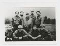 Photograph: [Nine Soldiers of the 494th Armored Field Artillery]