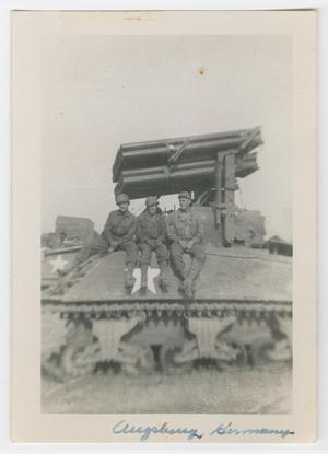 Primary view of object titled '[Three Soldiers Sitting on an M4 Tank]'.
