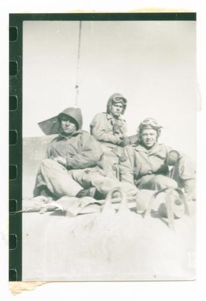 Primary view of object titled '[Three Soldiers Sitting Atop a Tank]'.