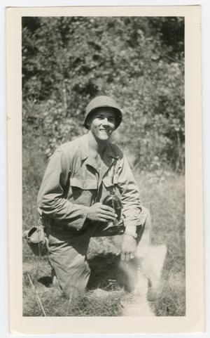 Primary view of object titled '[Soldier Holding a Canteen]'.