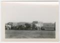 Photograph: [U.S. Army Vehicles Parked in a Line]