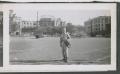 Photograph: [Soldier by Railroad Station]