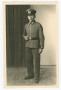 Photograph: [German Officer Standing by Curtain]