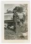Photograph: [Edwin Lahti Standing by a Half-Track]