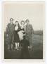 Photograph: [Two Couples on a Field at Camp Barkeley]