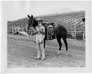 Primary view of object titled 'Mildred Farris and her Champion Barrel Racer'.
