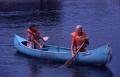 Photograph: [Photograph of Two Girls Paddling a Canoe]