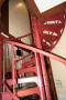 Photograph: [Photograph of a Red Spiral Staircase]
