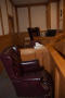 Photograph: [Large Leather Chairs Behind Judge's Bench]