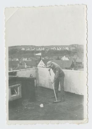 Primary view of object titled '[Soldier Sweeping Roof]'.