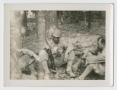 Photograph: [Soldiers Sitting Against Trees]