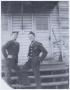 Photograph: [Two Soldiers Smoking Cigarettes]