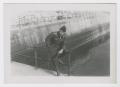 Photograph: [Soldier on Railing]
