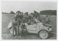 Photograph: [Soldiers in Volkswagen Kübelwagen]