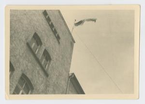 Primary view of object titled '[Flag on Roof]'.