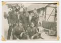 Photograph: [U.S. Army Soldiers Posing by a House]