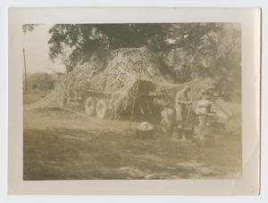 Primary view of object titled '[Soldiers by Camouflaged Truck]'.