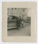 Photograph: [Woman Standing by Car]