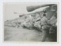 Photograph: [Soldier by Line of Tanks]