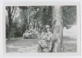 Photograph: [Soldier Leaning Against Tree]
