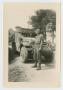 Photograph: [Soldier by Half-Track]