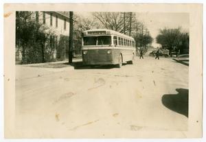 Primary view of [Photograph of Bus at 6th and Marsalis in Dallas]