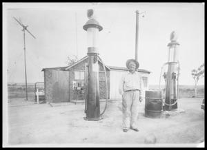 Primary view of object titled 'Man at Gas Station'.