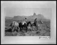 Primary view of Two Men Traveling With Four Horses and Foal