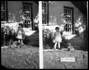 Primary view of object titled 'Virginia Lee with Puppy by Porch Steps'.