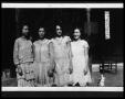 Photograph: Women in Front of House