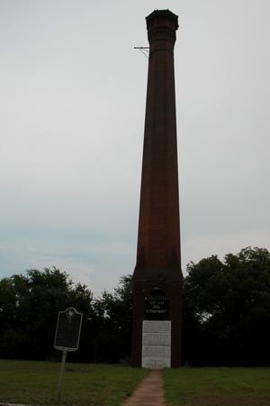 Primary view of object titled 'Red-brick smokestack of the Texas Pacific Coal and Oil Company, Thurber'.