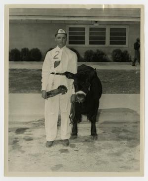 Primary view of object titled '[Jerome Boyd Collins, Sr. with a Cow]'.