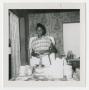 Primary view of [Young Woman Preparing Food]