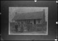 Thumbnail image of item number 1 in: '[Photograph of a Family at a Farm House]'.