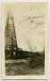 Photograph: [Photograph of an Oil Derrick and Gusher]