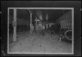 Primary view of [Photograph of Men in a Garage]