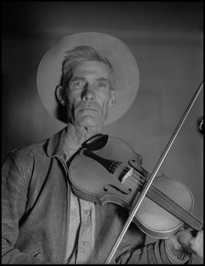 Primary view of object titled '[Photograph of a Fiddler]'.