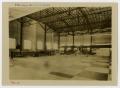 Photograph: [Airplanes Parked in a Hangar]