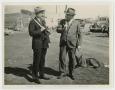 Photograph: [Two Men Holding Tools]