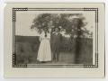 Thumbnail image of item number 1 in: '[Alex and Winnie Freeman Standing by Trees]'.