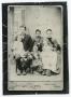 Photograph: [Photograph of the Gibbs Family in a Portrait Studio]