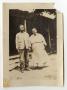 Thumbnail image of item number 1 in: '[Abner and Sarah Davis Standing by a House]'.