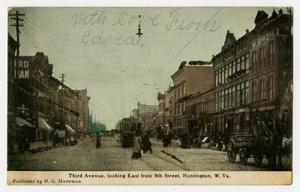 Primary view of object titled '[Postcard of a Busy Avenue in Huntington]'.
