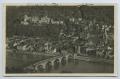 Primary view of [Postcard of Town Near Bridge Crossing Canal]